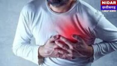 Use an image of a person clutching their chest or a medical heart icon with alt text: "Heart Attack Early Symptoms and Warning Signs."